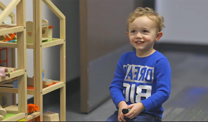 A child playing in the Olson Marriage and Family Therapy Clinic